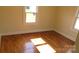 Bright bedroom with hardwood floors, showcasing natural light and a cozy atmosphere at 216 Park Ridge Rd, Albemarle, NC 28001