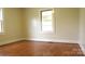 Cozy bedroom featuring hardwood floors and a window that offers ample natural light at 216 Park Ridge Rd, Albemarle, NC 28001
