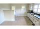 Functional kitchen with ample cabinet space and a practical layout, ready for your culinary touch at 216 Park Ridge Rd, Albemarle, NC 28001