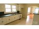 Functional kitchen with ample cabinet space and a practical layout, ready for your culinary touch at 216 Park Ridge Rd, Albemarle, NC 28001