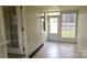 Charming sunroom with tile floor, offering a relaxing space with backyard access at 216 Park Ridge Rd, Albemarle, NC 28001