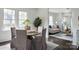 Cozy dining area featuring a round table, stylish chairs, and lots of natural light at 236 Victoria Ave, Charlotte, NC 28202