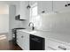 Beautiful modern kitchen featuring stainless steel appliances and stylish white cabinetry at 236 Victoria Ave, Charlotte, NC 28202