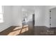 Bright and airy living room with hardwood floors and abundant natural light at 236 Victoria Ave, Charlotte, NC 28202