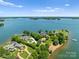 Breathtaking aerial view of the expansive lakefront property, highlighting its serene peninsula setting at 2477 Peninsula Shores Ct, Denver, NC 28037