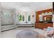 Elegant bathroom with a glass shower, jacuzzi tub, vanity, and decorative rug at 2477 Peninsula Shores Ct, Denver, NC 28037