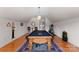 Spacious game room with a pool table, hardwood floors, and plenty of space for recreation at 2477 Peninsula Shores Ct, Denver, NC 28037