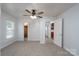 Comfortable bedroom with neutral walls, carpeting, a closet and an adjoining room at 28419 Nc Hwy 73 Hwy, Albemarle, NC 28001