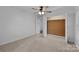 Bedroom featuring an open closet, plush carpet, and neutral wall color at 28419 Nc Hwy 73 Hwy, Albemarle, NC 28001