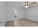 Bedroom featuring carpet, neutral walls and an en-suite bathroom at 28419 Nc Hwy 73 Hwy, Albemarle, NC 28001