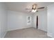 Bedroom with carpet, a window and a closet at 28419 Nc Hwy 73 Hwy, Albemarle, NC 28001