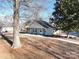 Charming home with a welcoming front porch, manicured lawn, and mature trees creating a picturesque setting at 28419 Nc Hwy 73 Hwy, Albemarle, NC 28001