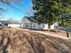 Charming single-story home with a well-maintained lawn and mature trees at 28419 Nc Hwy 73 Hwy, Albemarle, NC 28001