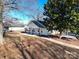 Charming home boasting a welcoming front porch, sidewalk, and manicured landscaping at 28419 Nc Hwy 73 Hwy, Albemarle, NC 28001
