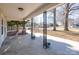Inviting front porch with decorative columns, potted plants, and a view of the surrounding neighborhood at 28419 Nc Hwy 73 Hwy, Albemarle, NC 28001