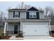 Charming two-story home with a two car garage and stone accents at 3422 Saddlebred Dr, Gastonia, NC 28052