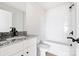 Bright bathroom with a granite vanity top and a shower and tub combination at 3430 Saddlebred Dr, Gastonia, NC 28052