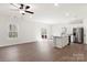 Stylish kitchen featuring stainless steel appliances, a central island, and an adjacent dining area at 3430 Saddlebred Dr, Gastonia, NC 28052