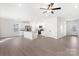 Open-concept kitchen with stainless steel appliances, an island, and easy access to the living area at 3430 Saddlebred Dr, Gastonia, NC 28052