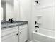 Bathroom featuring a granite countertop and combination shower-tub at 3527 Clover Valley Dr, Gastonia, NC 28052