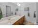 Bathroom featuring a double vanity, tile floors, a large mirror, and neutral walls at 437 Buttermere Rd # 31, Fort Mill, SC 29715