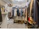 Spacious walk-in closet offering custom shelving, racks, and ample storage at 437 Buttermere Rd # 31, Fort Mill, SC 29715