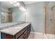 Bathroom featuring a double vanity and tiled shower at 5252 Admirals Lndg, Lancaster, SC 29720