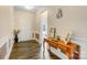 Welcoming foyer with wood floors, decorative table, and elegant decor at 5252 Admirals Lndg, Lancaster, SC 29720