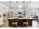 Modern kitchen with a large island, granite countertops, and stainless steel appliances at 5252 Admirals Lndg, Lancaster, SC 29720