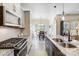 Modern kitchen with granite countertops, stainless steel appliances, and gas range at 5252 Admirals Lndg, Lancaster, SC 29720