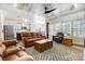 Spacious living room with leather couches, custom ceiling, and lots of natural light at 5252 Admirals Lndg, Lancaster, SC 29720
