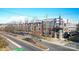 Wide aerial perspective of townhomes, showcasing balconies, architectural elements, and street appeal at 530 N Mcdowell St, Charlotte, NC 28204