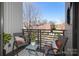 Private balcony with comfortable seating offers a relaxing outdoor space at 530 N Mcdowell St, Charlotte, NC 28204