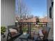 View from balcony includes seating, flower pot, and neighborhood at 530 N Mcdowell St, Charlotte, NC 28204