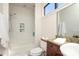 Elegant bathroom featuring a walk-in shower, granite countertops, and modern fixtures at 530 N Mcdowell St, Charlotte, NC 28204
