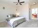 Bright bedroom with a ceiling fan and ensuite bathroom offers a relaxing and private retreat at 530 N Mcdowell St, Charlotte, NC 28204