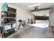 Clean, organized garage with storage shelves, bikes, and an open entryway to the outdoors at 530 N Mcdowell St, Charlotte, NC 28204