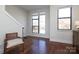 Bright living room featuring hardwood floors, modern furniture, and large windows offering natural light at 530 N Mcdowell St, Charlotte, NC 28204