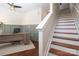 Office and stairs featuring hardwood floors, neutral walls, and stylish board and batten wall trim at 530 N Mcdowell St, Charlotte, NC 28204