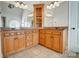 Spacious bathroom with double sink vanity, granite counters, and glass shower at 6548 Robin Hollow Dr, Mint Hill, NC 28227