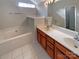 Bathroom with double vanity, bathtub and ample counterspace at 7829 Buddy Holly Rd, Charlotte, NC 28216