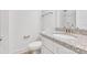 Bathroom featuring granite countertop, white vanity, and fixtures at 81 Kirk St, Salisbury, NC 28144