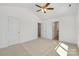 Spacious bedroom with neutral carpet and attached doors at 81 Kirk St, Salisbury, NC 28144