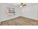 Bright living room featuring natural light and wood-look floors at 81 Kirk St, Salisbury, NC 28144