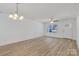 Open concept living room featuring modern lighting and large windows at 81 Kirk St, Salisbury, NC 28144