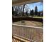 View of fenced backyard and fire pit at 827 W Horah St, Salisbury, NC 28144