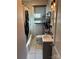Bathroom featuring tiled floors, bathtub with shower, and modern vanity at 827 W Horah St, Salisbury, NC 28144