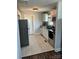 This kitchen has white cabinets, stainless steel appliances, granite countertops and tile floor, perfect for cooking and entertaining at 827 W Horah St, Salisbury, NC 28144