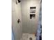 Shower with modern tiling and a convenient built-in storage niche at 827 W Horah St, Salisbury, NC 28144