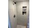 Shower with modern tiling and a convenient built-in storage niche at 827 W Horah St, Salisbury, NC 28144
